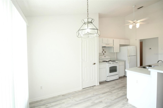 kitchen with sink, ceiling fan, white appliances, and light hardwood / wood-style floors