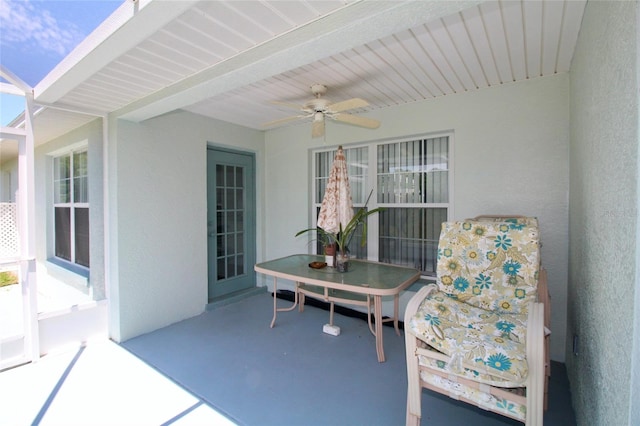 view of patio / terrace featuring ceiling fan