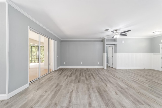 unfurnished room featuring baseboards, light wood-style flooring, a ceiling fan, and crown molding