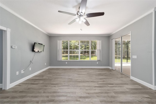 10020 SW 202nd Cir, Dunnellon, FL 34431 - empty room with ornamental molding, a ceiling fan, and wood finished floors