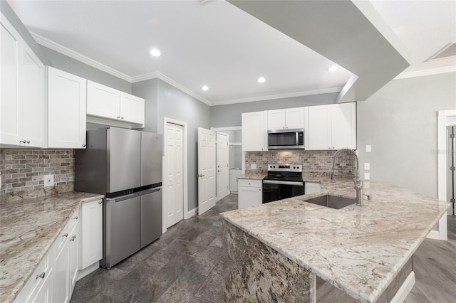 10020 SW 202nd Cir, Dunnellon, FL 34431 - kitchen featuring stainless steel appliances, a peninsula, light stone counters, white cabinets, and crown molding