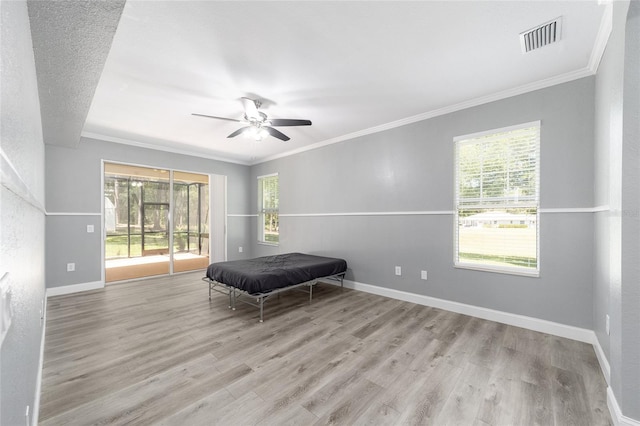 bedroom featuring access to exterior, ceiling fan, ornamental molding, and light wood-type flooring