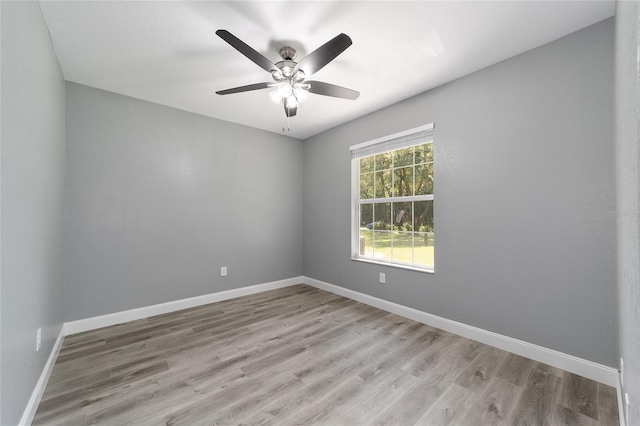 10020 SW 202nd Cir, Dunnellon, FL 34431 - unfurnished room featuring light wood-style flooring and ceiling fan