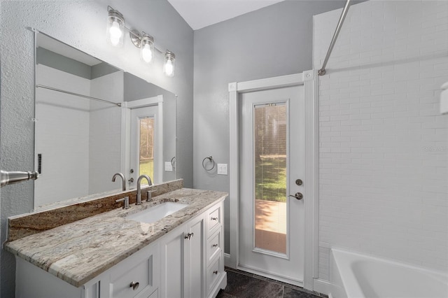 10020 SW 202nd Cir, Dunnellon, FL 34431 - full bath featuring vanity, plenty of natural light, and shower / tub combination