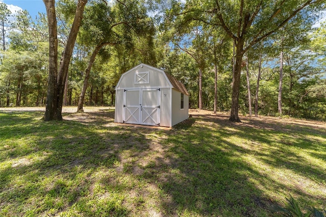 view of outdoor structure featuring a yard