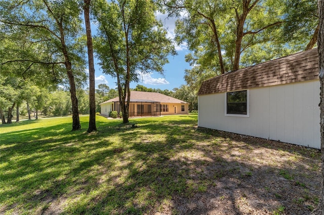 10020 SW 202nd Cir, Dunnellon, FL 34431 - view of grassy yard with an outbuilding