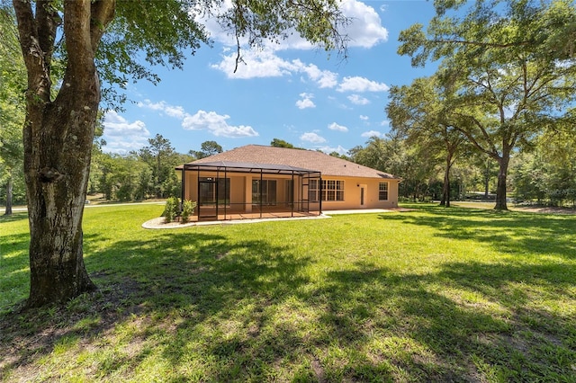10020 SW 202nd Cir, Dunnellon, FL 34431 - rear view of property featuring a yard and a lanai