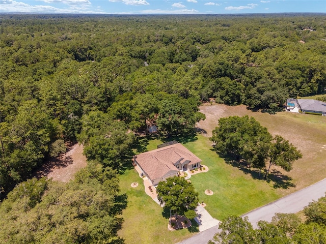 drone / aerial view with a forest view