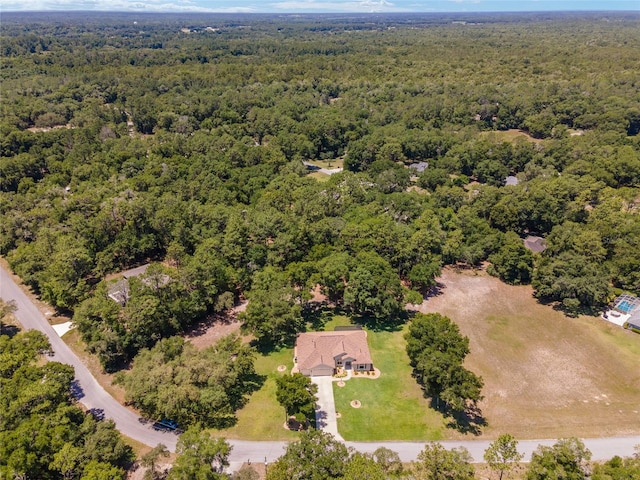 aerial view featuring a forest view