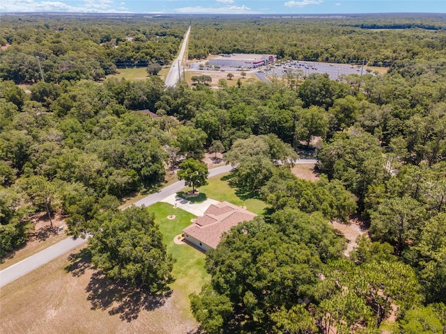 bird's eye view featuring a view of trees