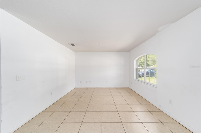 view of tiled spare room