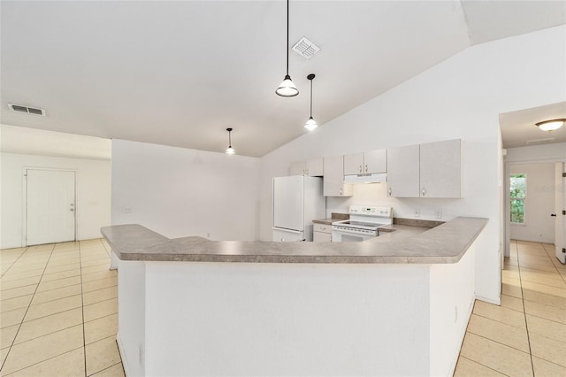 kitchen featuring kitchen peninsula, light tile patterned floors, hanging light fixtures, and white appliances