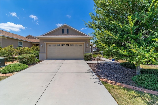 single story home with a garage