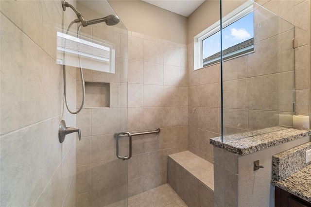 bathroom featuring an enclosed shower