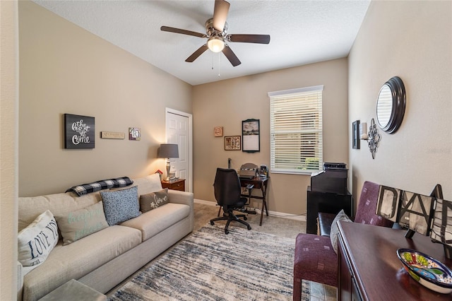 office space featuring carpet flooring and ceiling fan