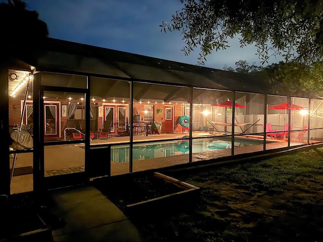 exterior space featuring a lanai and a patio