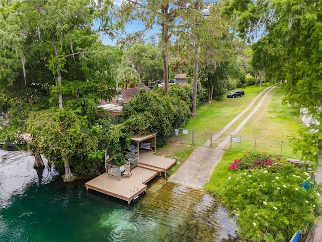 drone / aerial view with a water view