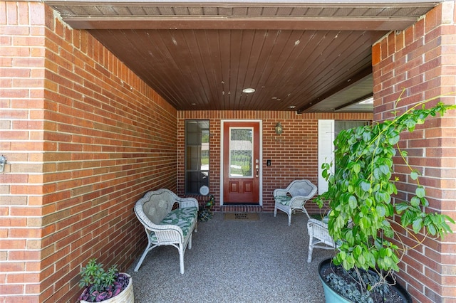 property entrance with a patio area