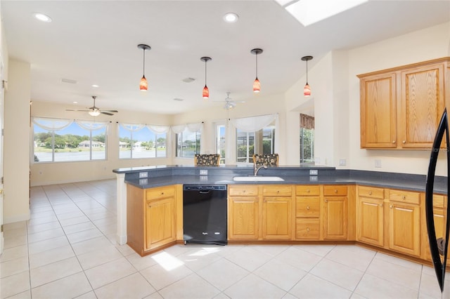 kitchen with kitchen peninsula, ceiling fan, dishwasher, and decorative light fixtures