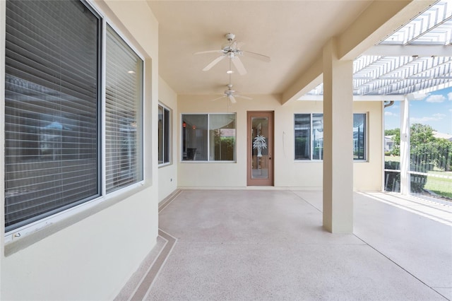 view of patio / terrace featuring a pergola and ceiling fan