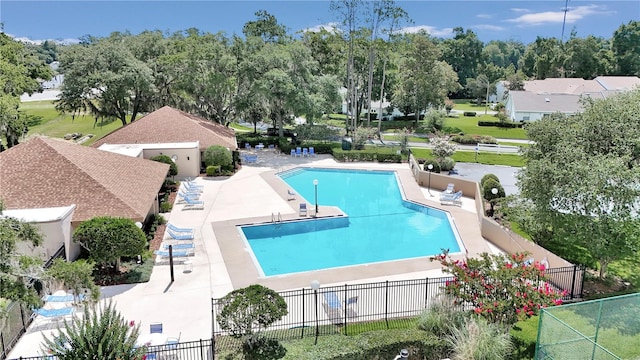 view of swimming pool with a patio