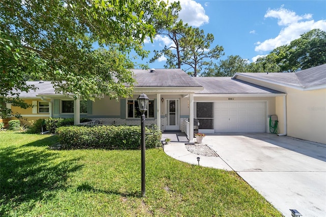 ranch-style home with a garage and a front yard