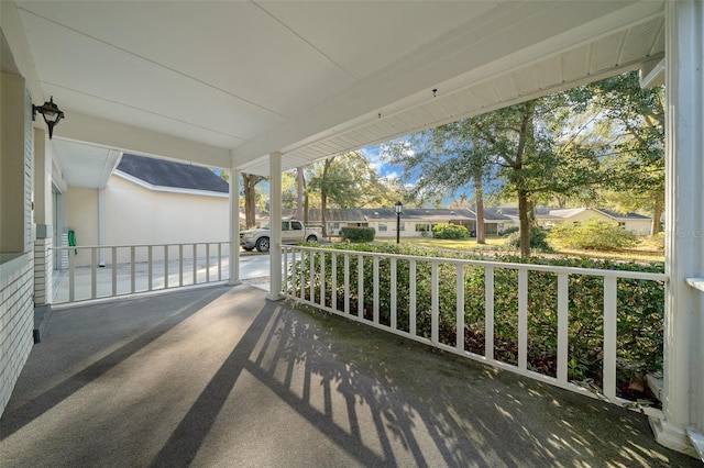 balcony featuring a porch