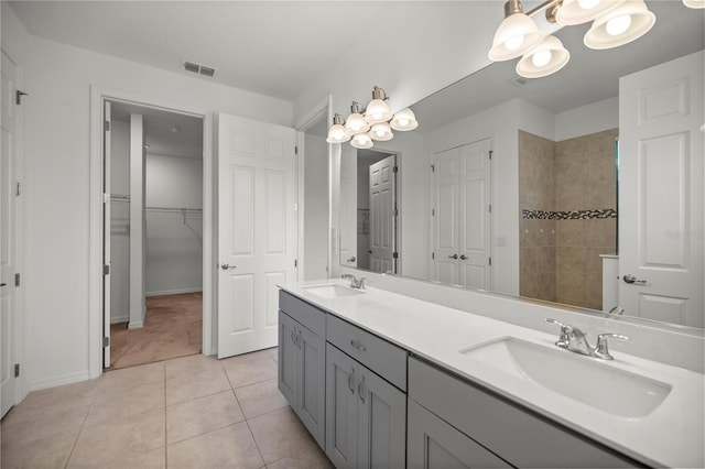 bathroom featuring tile patterned floors and vanity