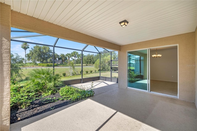 view of patio / terrace featuring a lanai