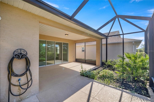 view of patio / terrace with a lanai