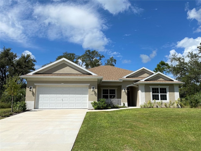 ranch-style house with covered porch, a garage, and a front yard