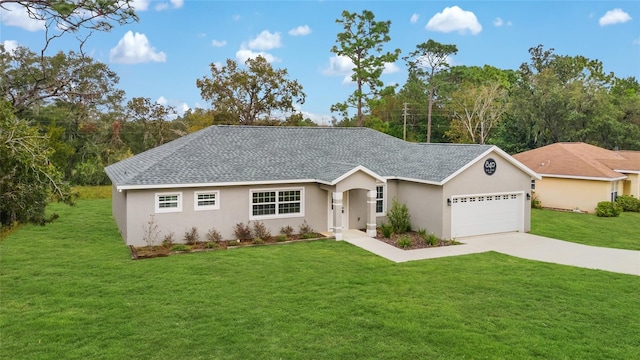 ranch-style home featuring a garage and a front yard