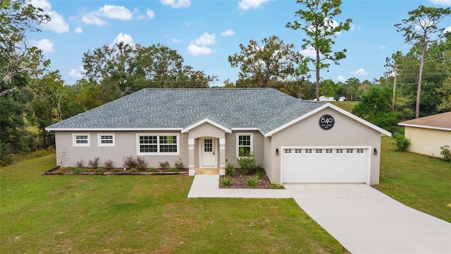 ranch-style house with a garage and a front yard