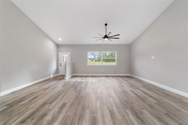 empty room featuring light hardwood / wood-style floors and ceiling fan