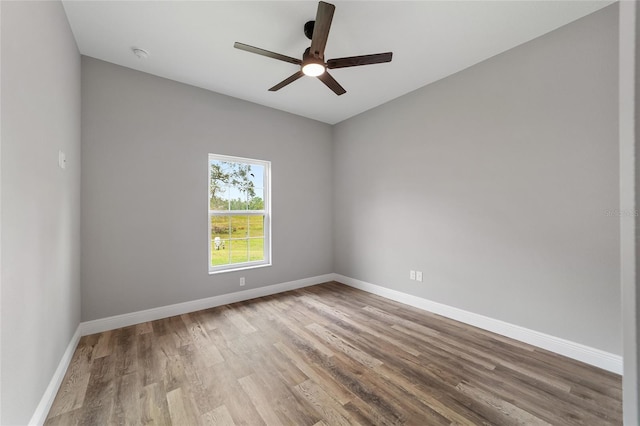 unfurnished room featuring ceiling fan and light hardwood / wood-style floors