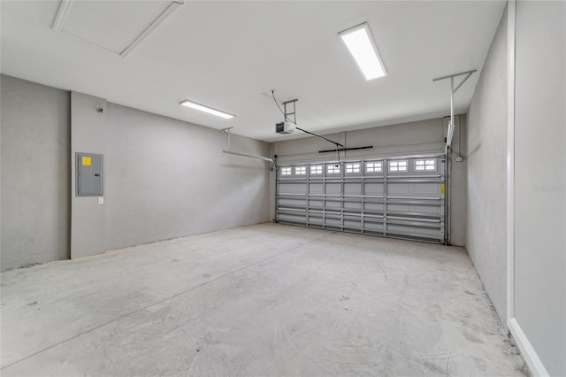 garage with electric panel and a garage door opener