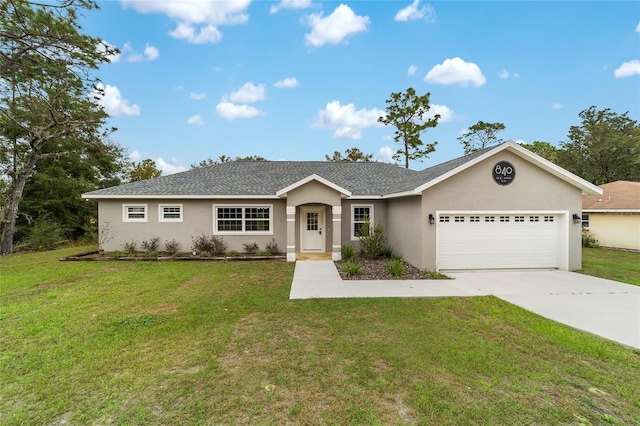 single story home featuring a garage and a front lawn