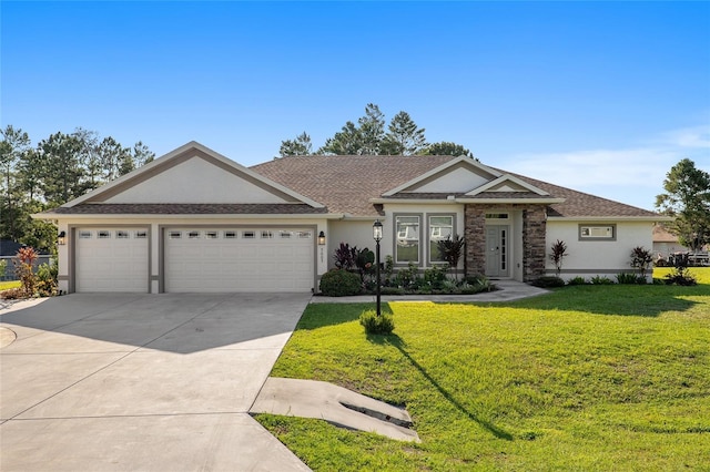 ranch-style house with a front yard and a garage