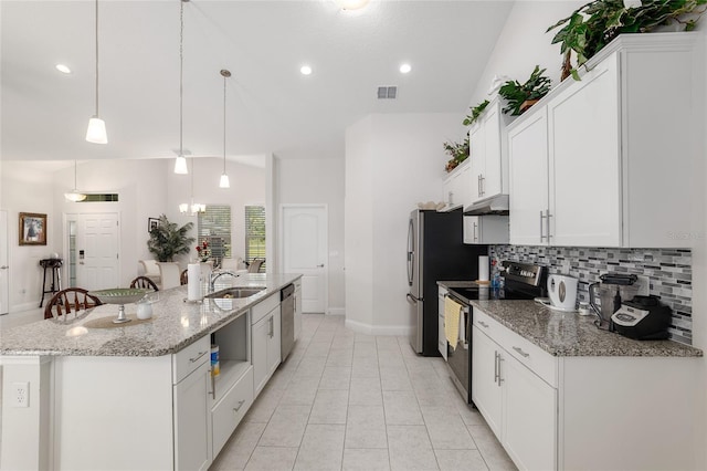 kitchen with appliances with stainless steel finishes, white cabinetry, hanging light fixtures, and an island with sink