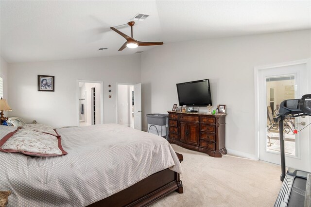 carpeted bedroom featuring vaulted ceiling and ceiling fan