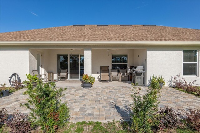 rear view of property with a patio