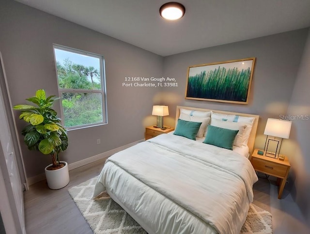 bedroom featuring light wood-type flooring