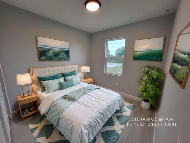 bedroom featuring wood-type flooring