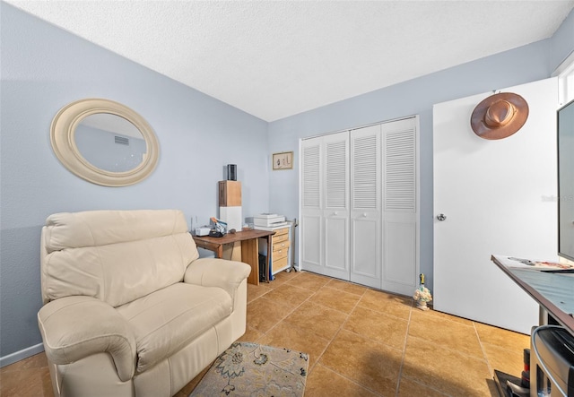 living area with light tile patterned flooring