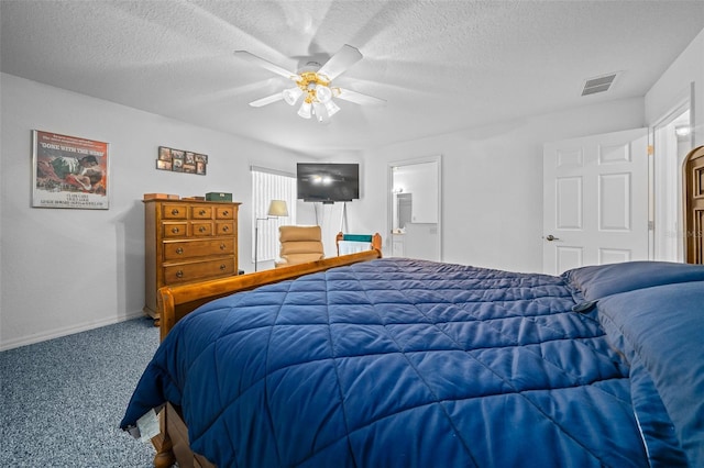 carpeted bedroom with visible vents, ceiling fan, a textured ceiling, and baseboards