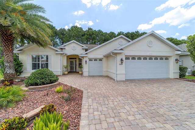 single story home featuring a garage