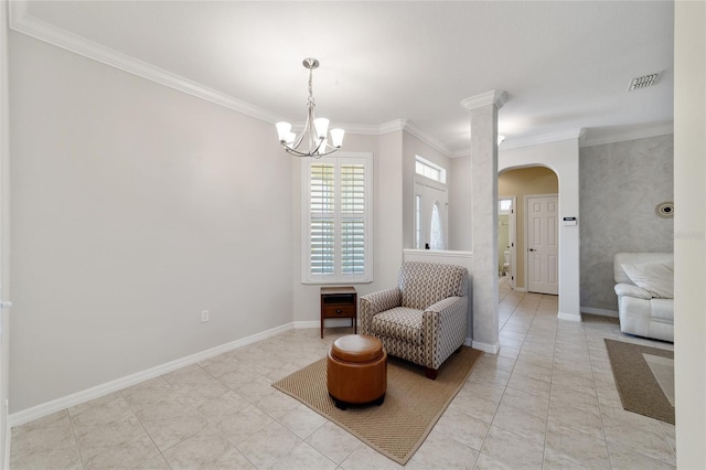 living area featuring light tile patterned floors, crown molding, and a notable chandelier