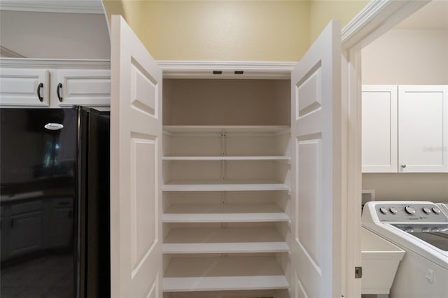 pantry with washer / clothes dryer