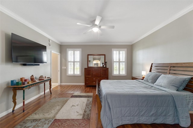 bedroom with ceiling fan, light hardwood / wood-style flooring, and crown molding