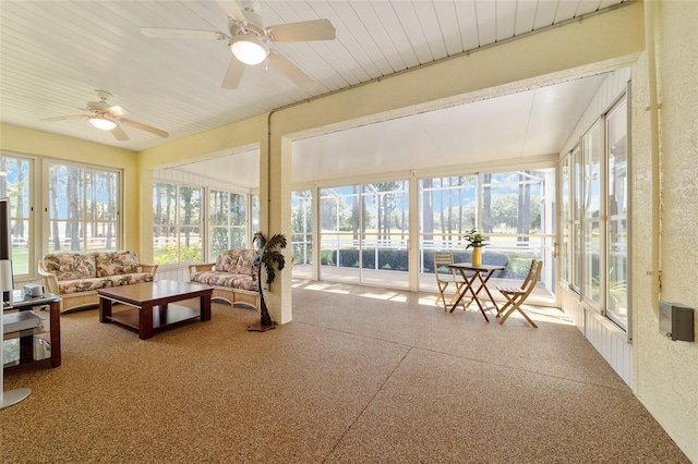 sunroom / solarium with ceiling fan